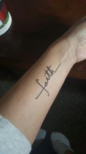 wording hand tattoo